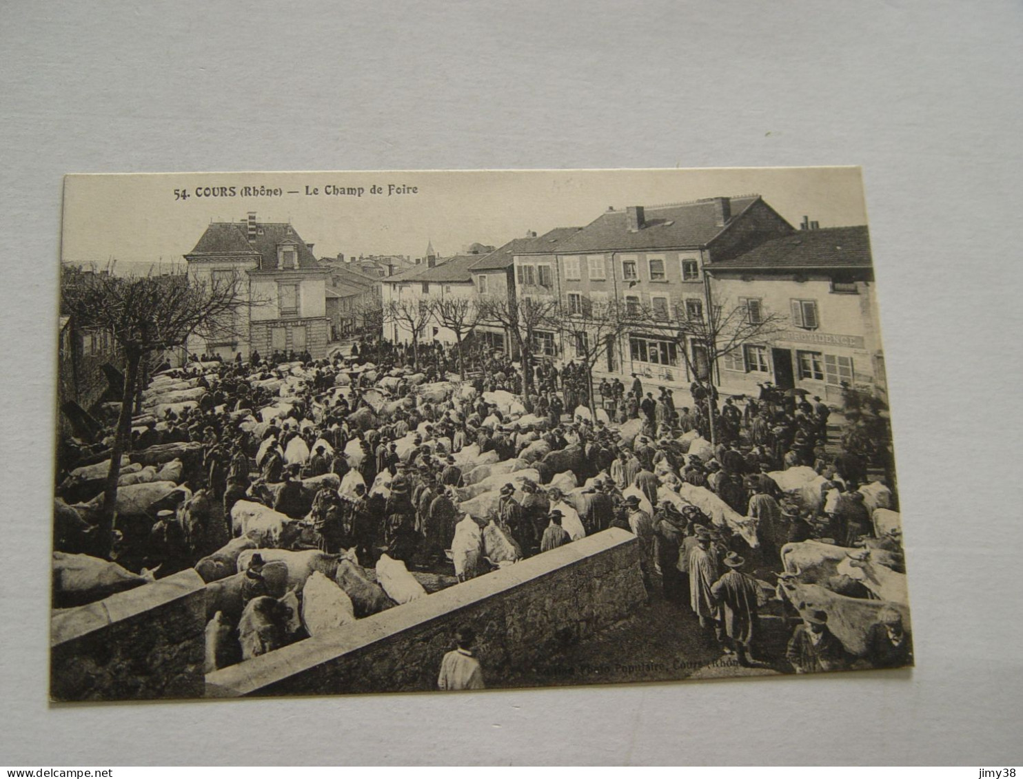 RHONE-COURS-54-LE CHAMP DE FOIRE -ANIMEE CARTE PUB PHOTO POPULAIRE RENE LAUXEROIS MONNIER - Cours-la-Ville