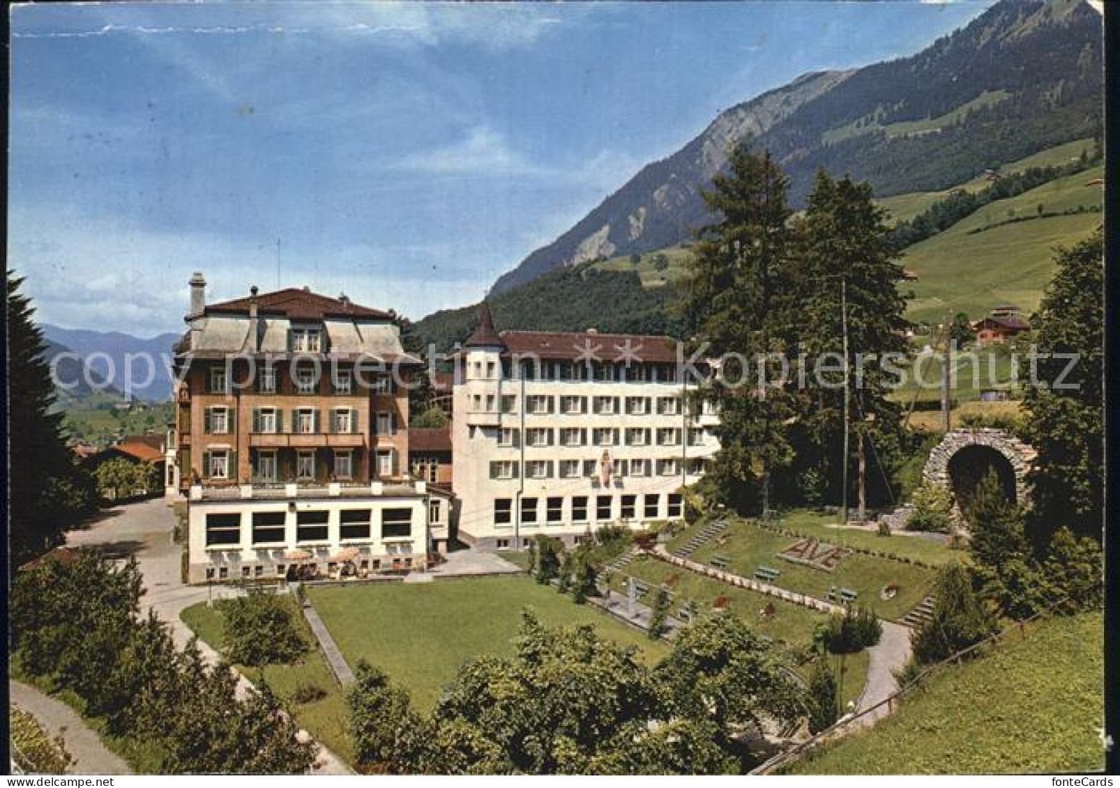 12597781 Lungern Haus St. Josef Mit Marienburg Und Grotte Lungern - Autres & Non Classés