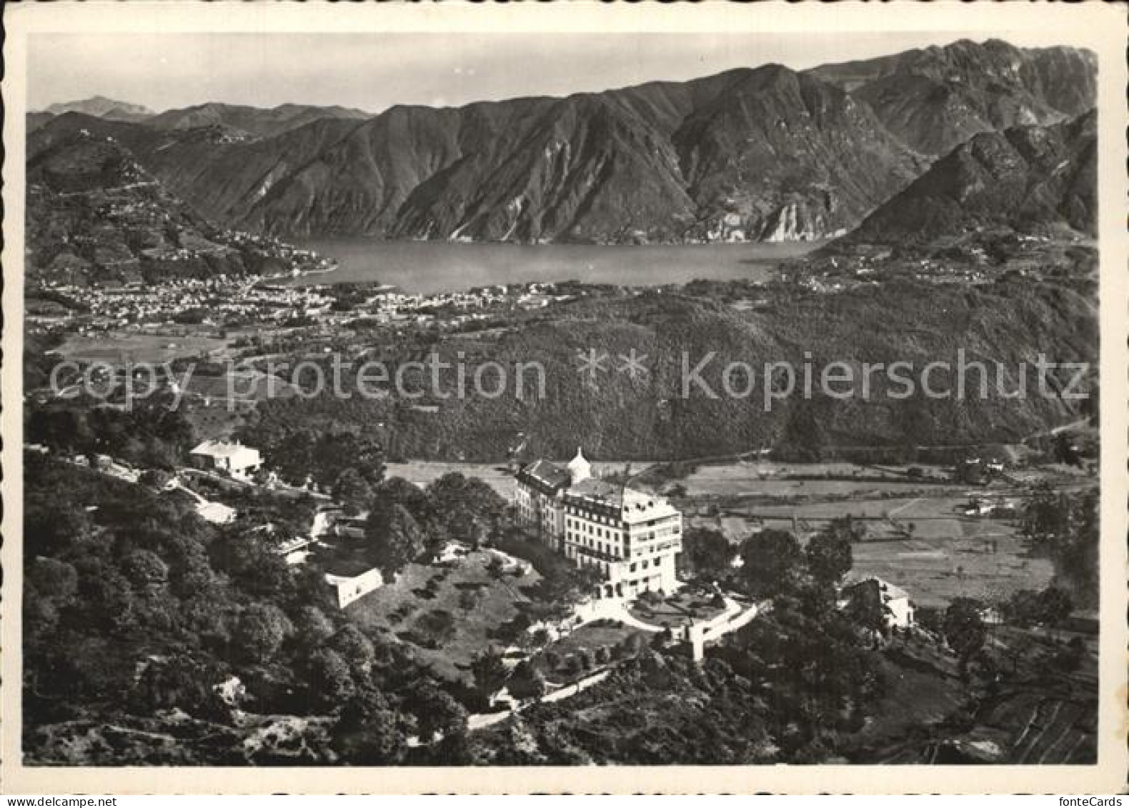 12419818 Cademario Fliegeraufnahme Kurhaus Cademario Mit Blick Nach Lugano Cadem - Andere & Zonder Classificatie