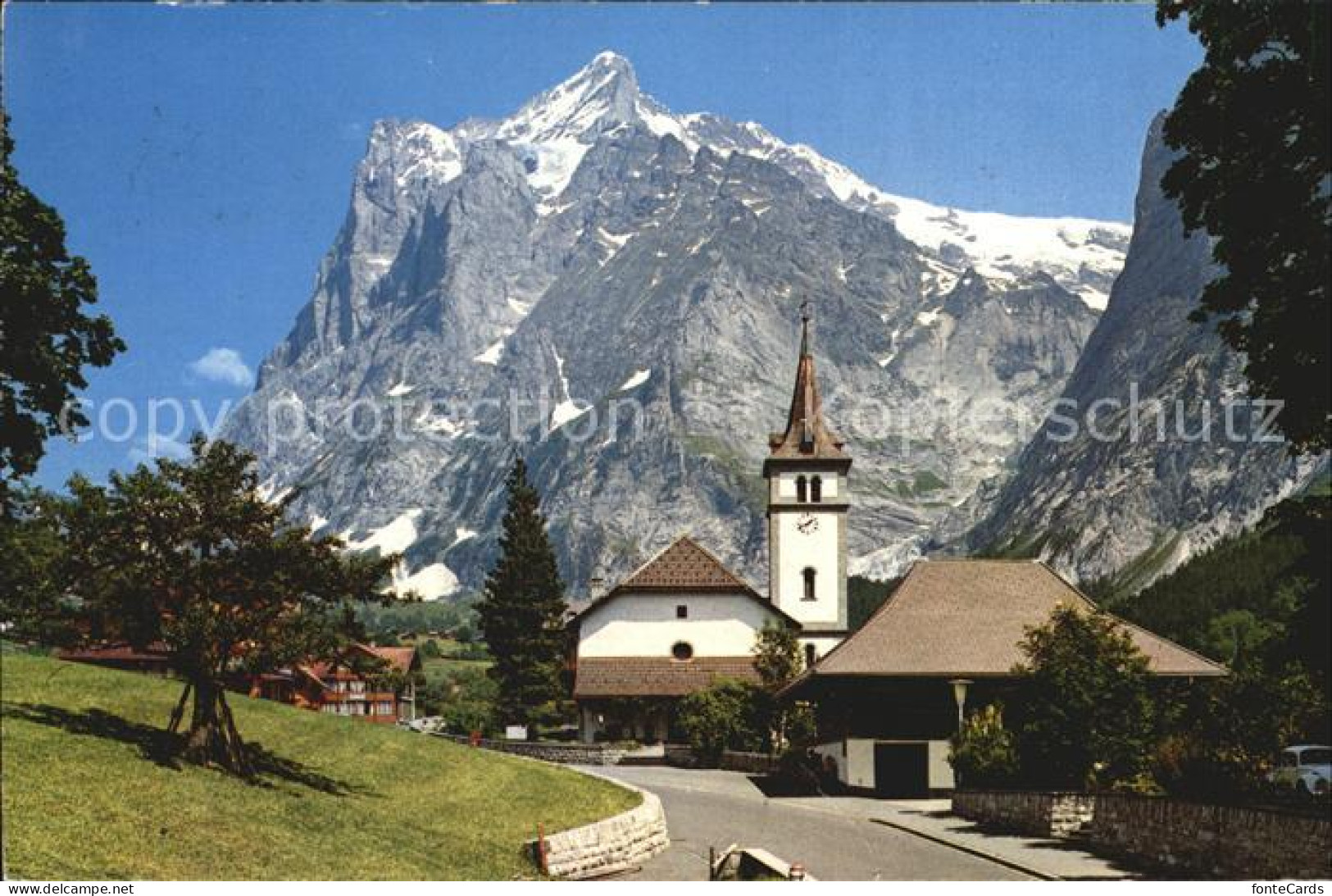 12396958 Grindelwald Mit Kirche Und Wetterhorn Grindelwald - Sonstige & Ohne Zuordnung