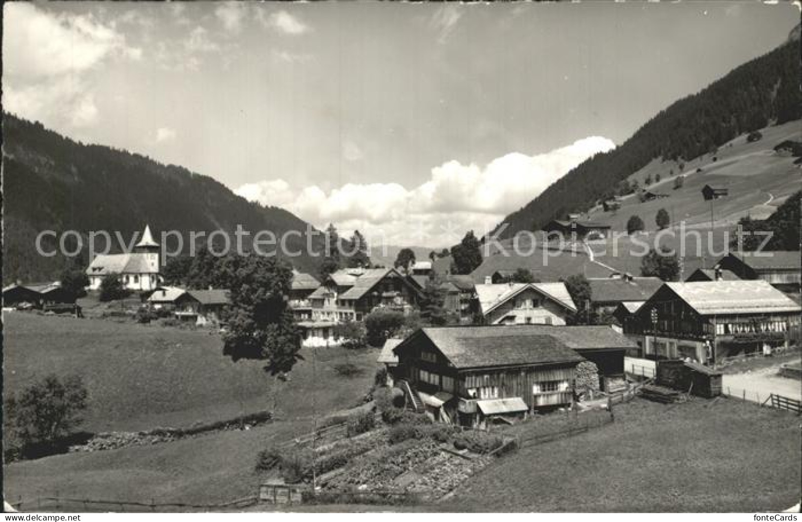 12323370 Lauenen Ortsansicht Mit Kirche Berner Oberland Lauenen - Autres & Non Classés