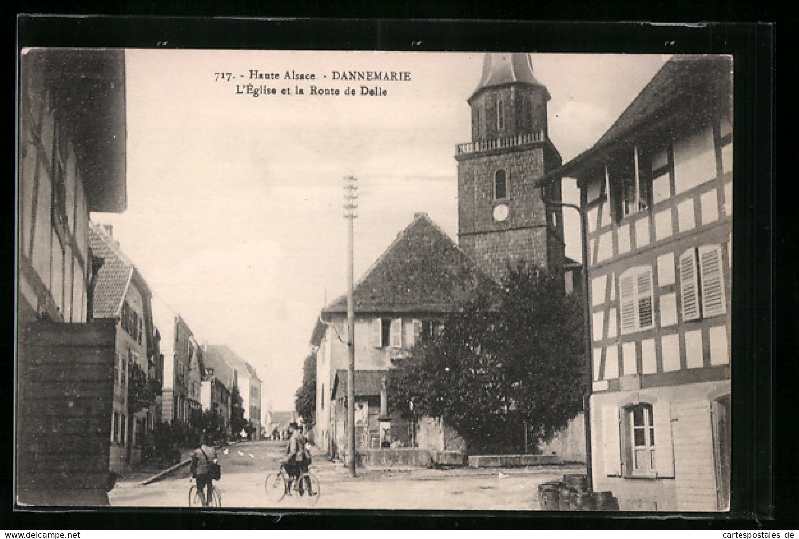 CPA Dannemarie, L`Èglise Et La Route De Delle  - Dannemarie