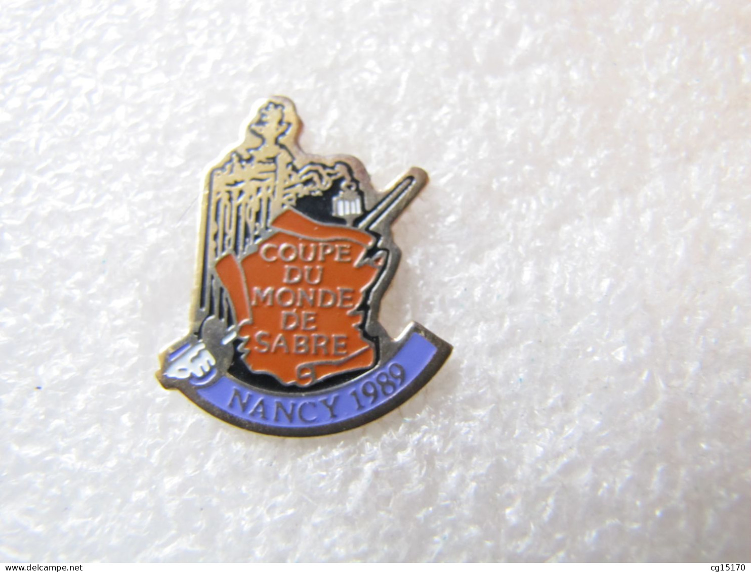 PIN'S    SPORT  ESCRIME    COUPE DU MONDE DE SABRE  NANCY 1989 - Scherma