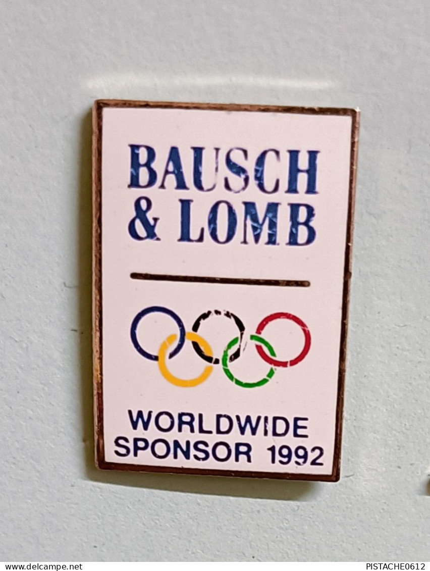 Pin's Jeux Olympique Albertville Bausch & Lomb Worldwide Sponsor 1992 Signé Official Canadian Olympic Assoc - Jeux Olympiques