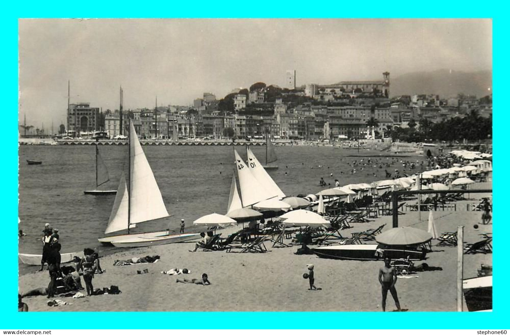 A871 / 165 06 - CANNES Plage Et Le Suquet - Cannes