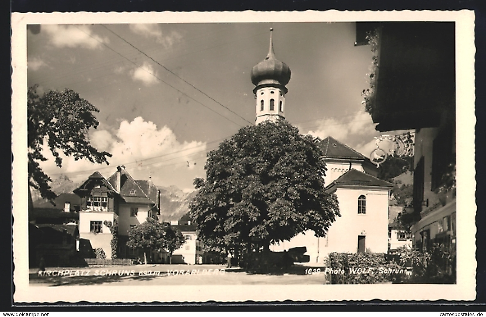 AK Schruns Im Montafon, Strassenpartie Bei Der Kirche  - Altri & Non Classificati