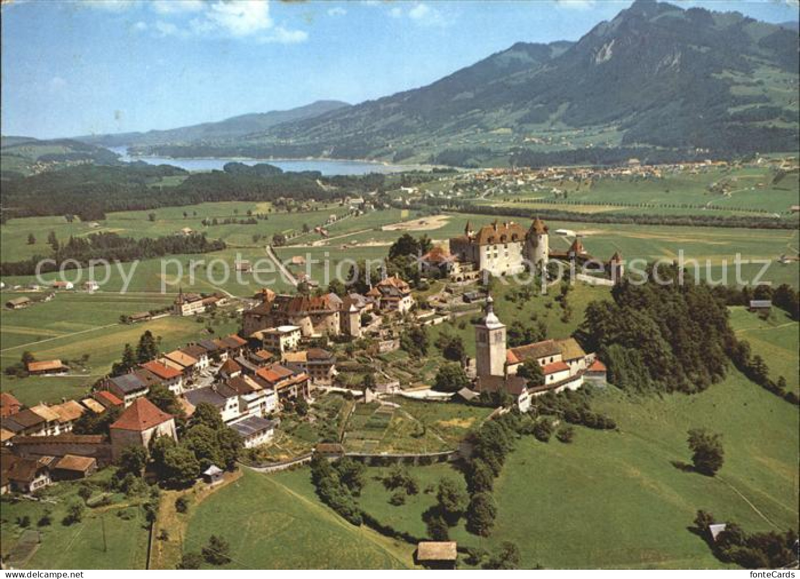 11871608 Gruyeres FR Fliegeraufnahme Au Fond Broc  Gruyeres - Altri & Non Classificati