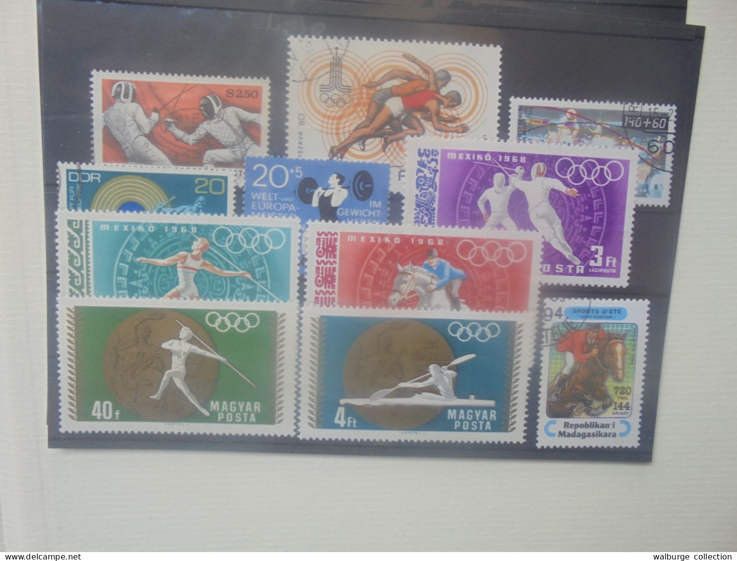 THEMATIQUE "SPORTS" BLOCS+SERIES+TIMBRES  .A SAISIR !!! (4395) 1 KILO 550 (PAS D'OFFRES INFERIEURES)