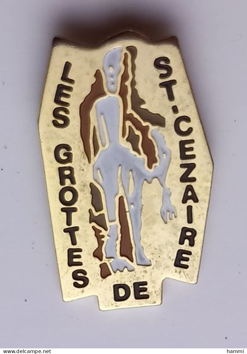 G309 Pin's Dinosaure Préhistoire Spéléologie Les Grottes De ST Saint-Cézaire-sur-Siagne Alpes-Maritimes Achat Immédiat - Ciudades