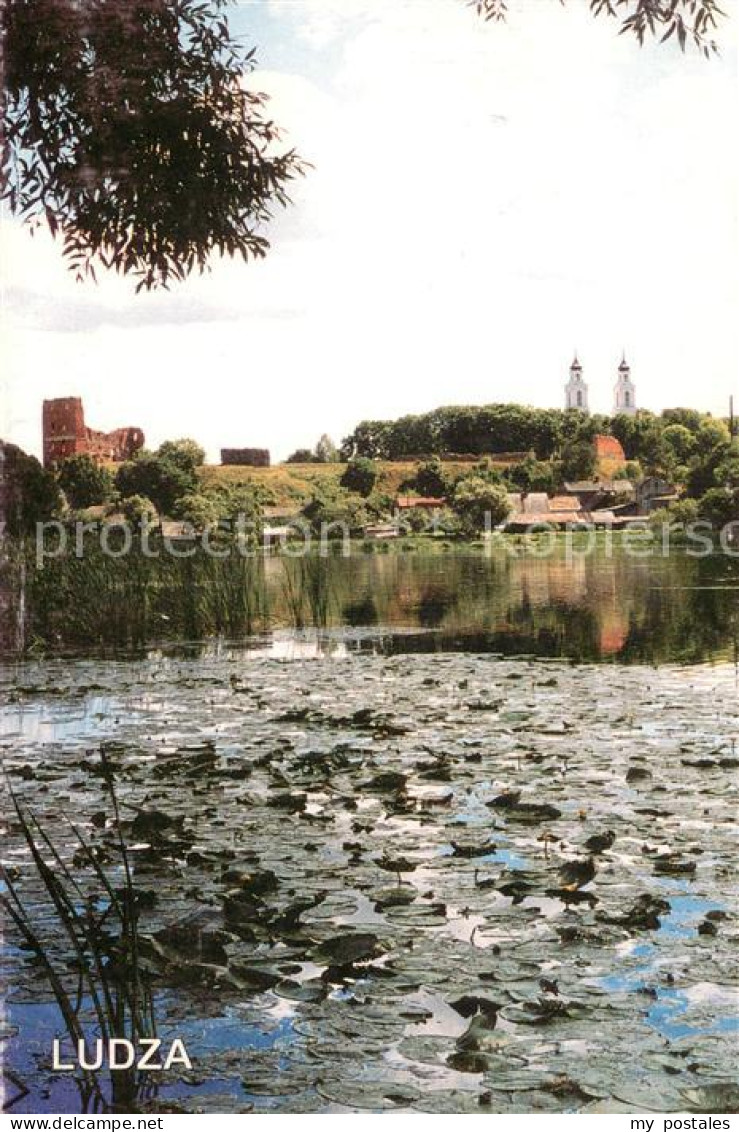 73637467 Ludza Uferpartie Am Fluss Blick Zur Stadt  - Lettland