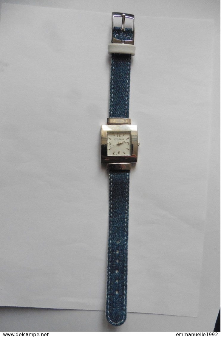 Montre Femme Réversible Steltman Métal Argenté Tissu Jean Bleu Et Cuir Blanc - Moderne Uhren