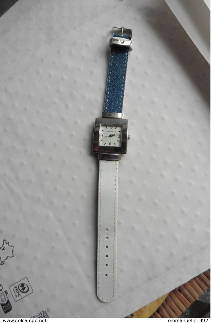 Montre femme réversible Steltman métal argenté tissu jean bleu et cuir blanc