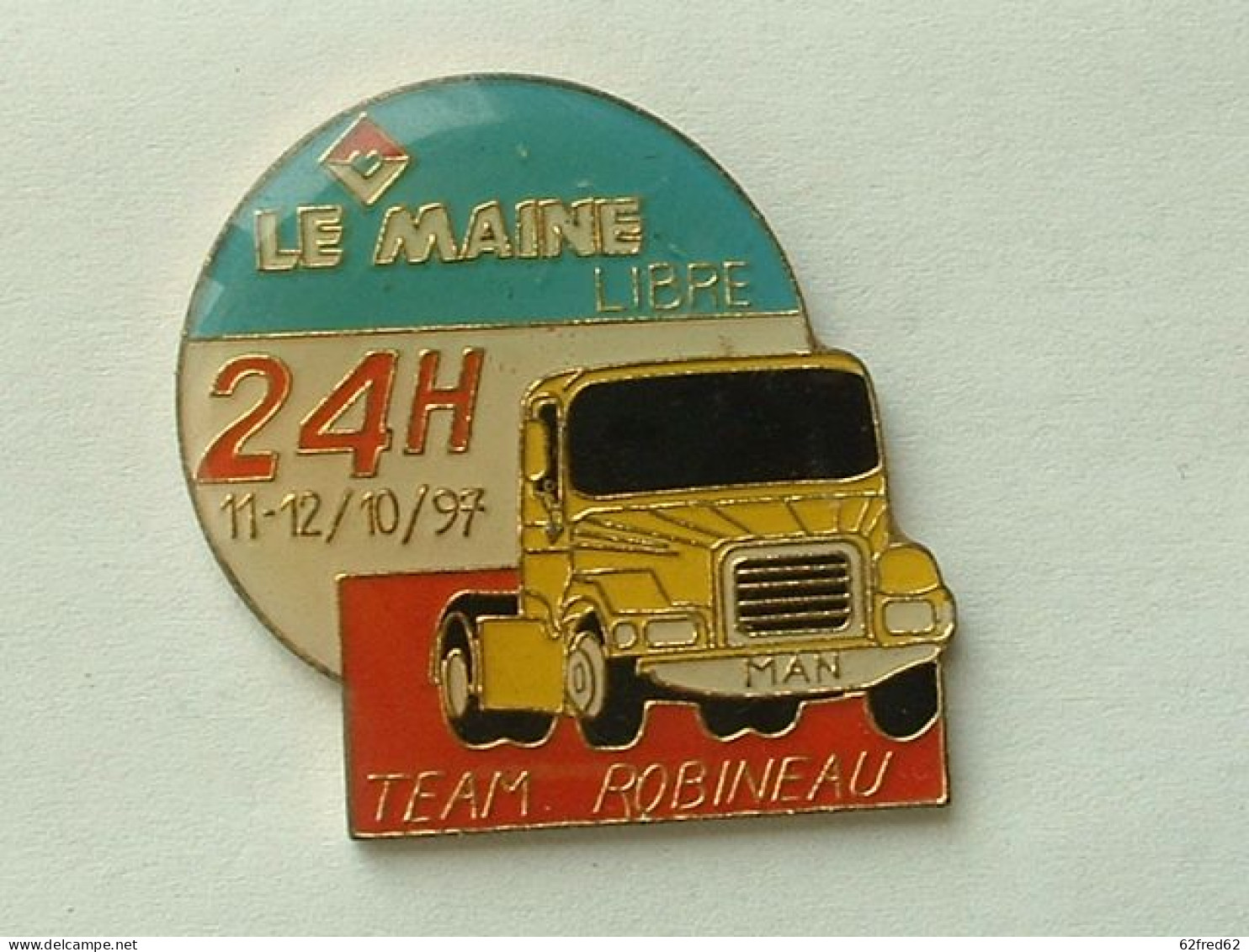 Pin's LE MAINE LIBRE -  GP CAMION 97 - MAN - Trasporti