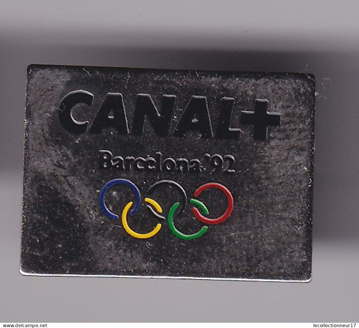 Pin's JO Barcelona 92 Canal+ Réf 8416 - Olympische Spiele