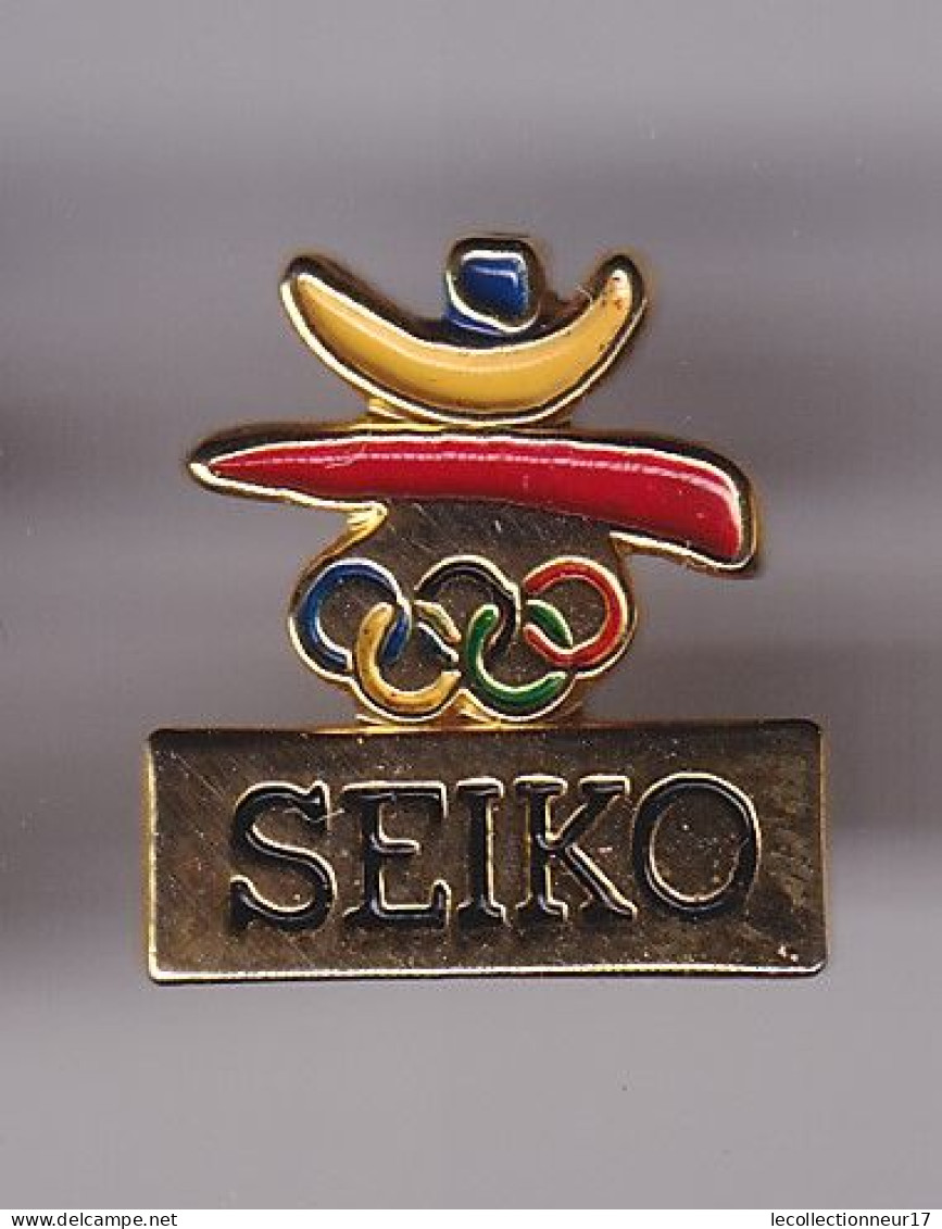 Pin's JO Barcelona 92 Logo Seiko Réf 8420 - Olympische Spelen