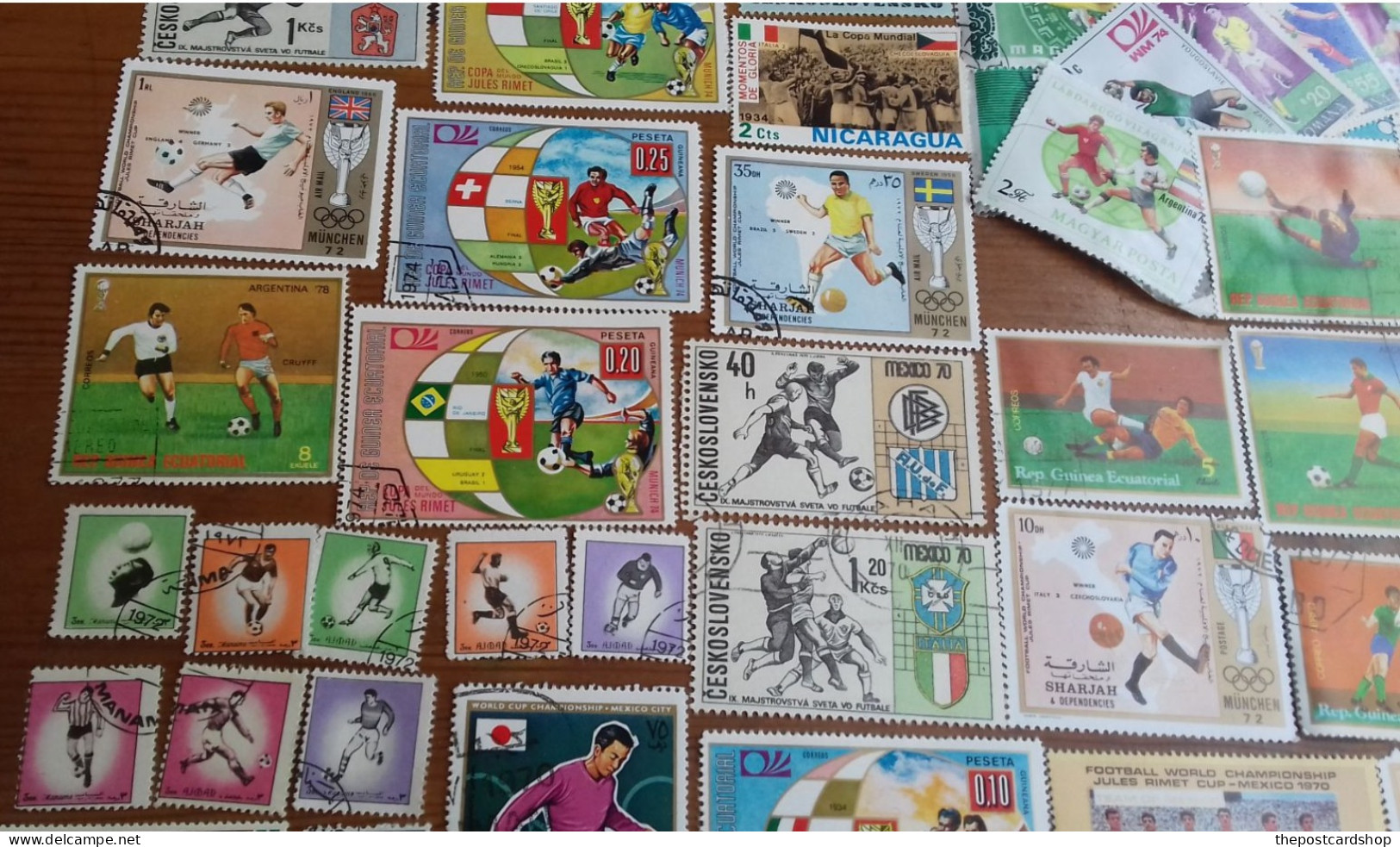 100 DIFFERENT FOOTBALL SOCCER STAMPS ALL ARE ALMOST FROM 50 YEARS AGO PELE BOBBY MOORE ETC