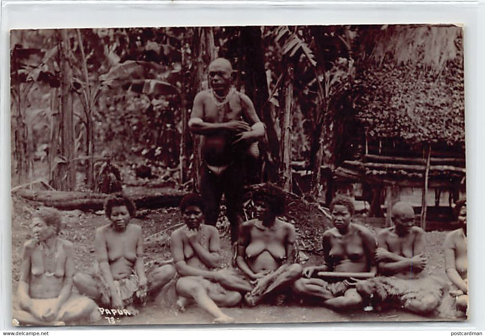 PAPUA NEW GUINEA - Papuan Chief And His Nude Wives - REAL PHOTO - Publ. W. H. Cooper. - Papoea-Nieuw-Guinea