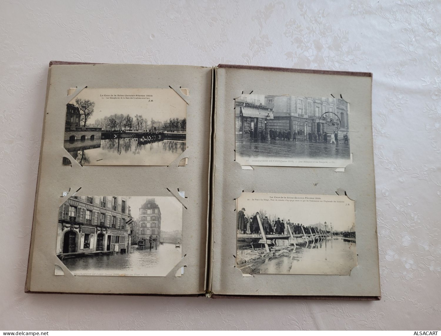 album avec environs 95 cartes sur l'innondation , paris et banlieue , dont cartes photos , animées