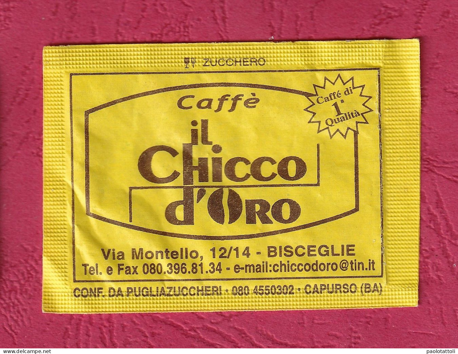 Italy. Bustina Vota Zucchero, Empty Sugar Bag- Caffè Il Chicco D'Oro, Bisceglie. Barzelletta.Packed By Puglia Zuccheri, - Sucres