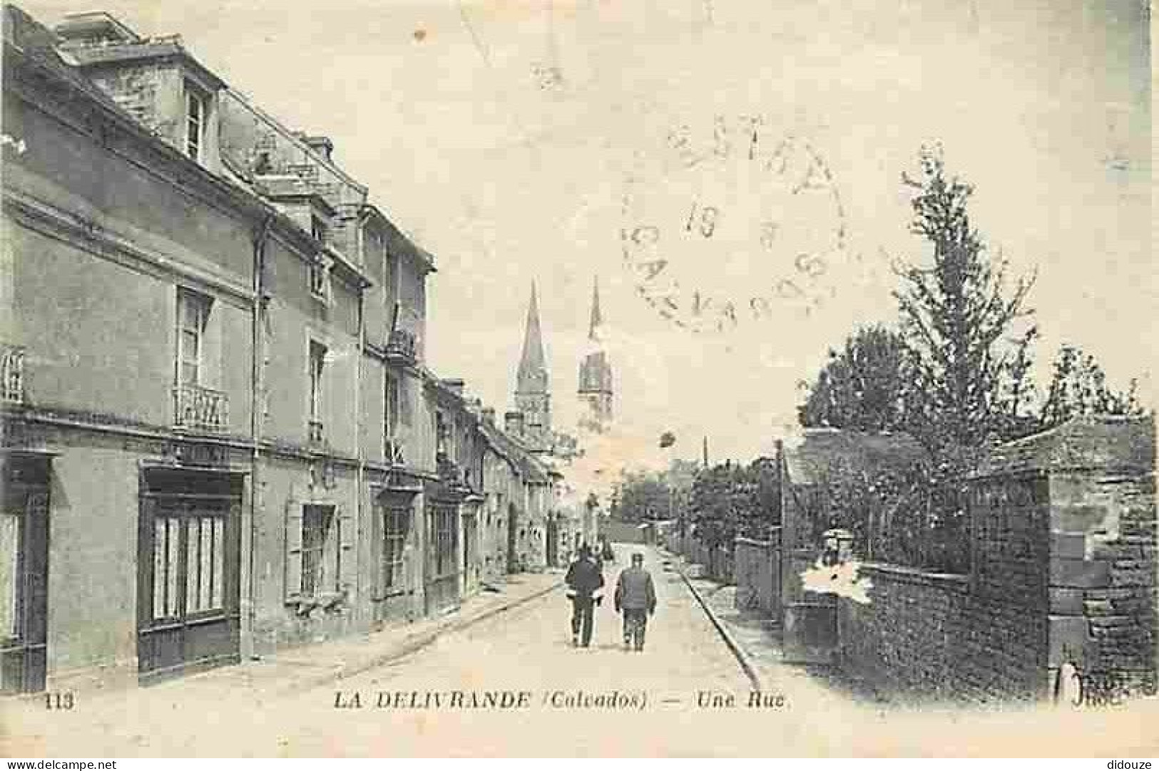 14 - La Délivrande - Une Rue - Animée - Oblitération Ronde De 1922 - CPA - Voir Scans Recto-Verso - La Delivrande