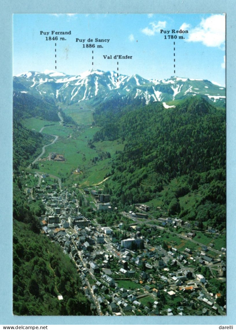 CP 63 - Le Mont Dore - Vue Générale Aérienne Et La Chaine Du Sancy - Le Mont Dore