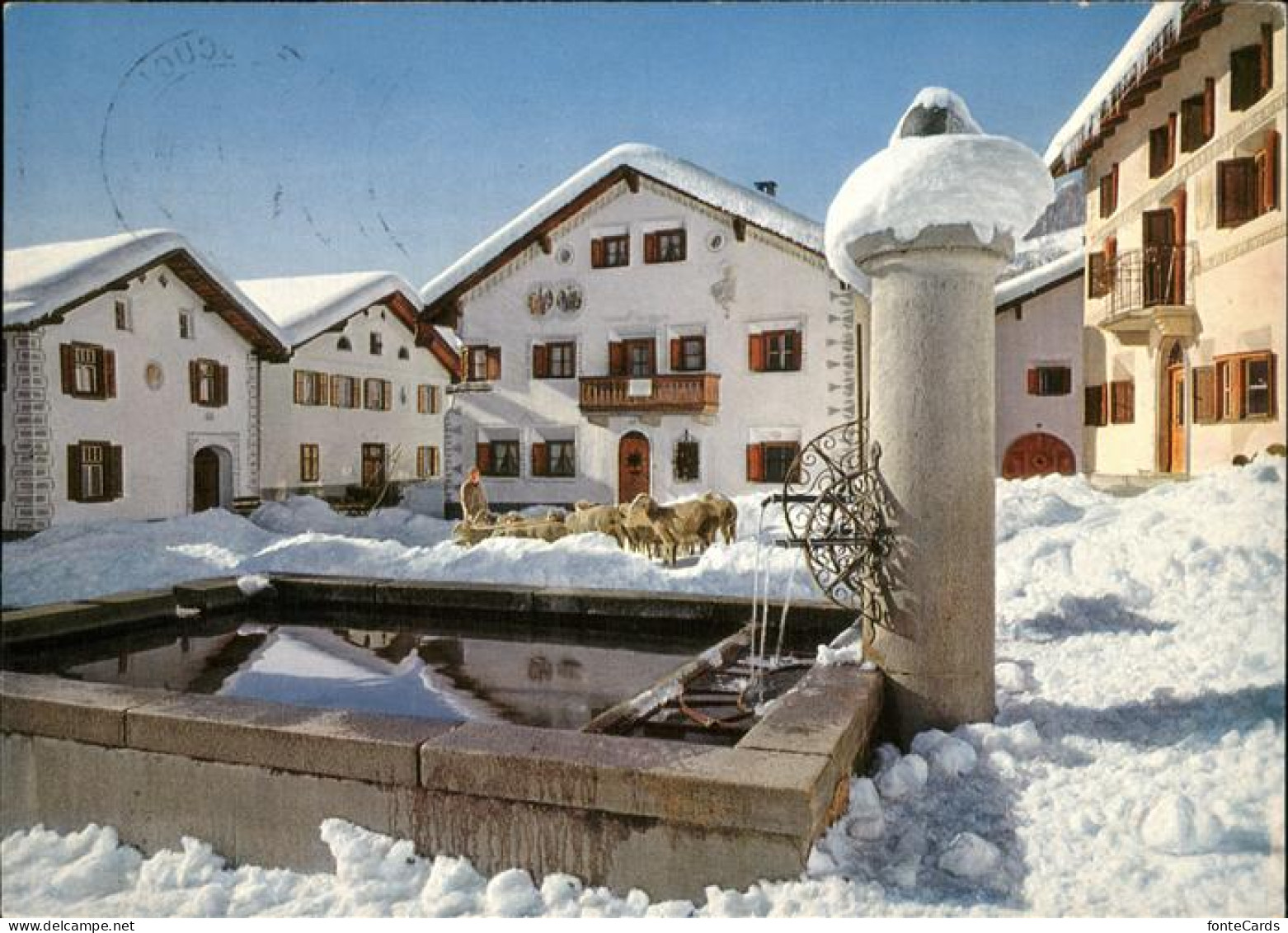 11467139 Scuol Wintersportplatz Heilbad Dorfplatz Brunnen Schafe Scuol - Sonstige & Ohne Zuordnung