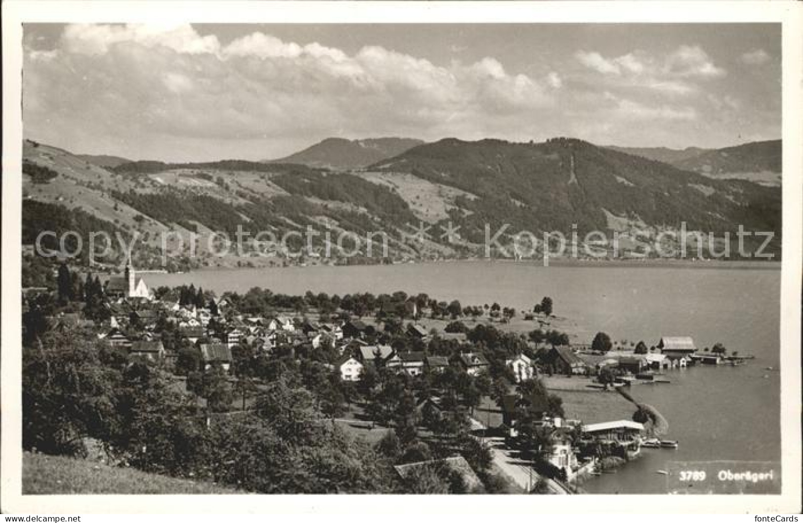 12320786 Oberaegeri Panorama Mit See Und Bergen Oberaegeri - Altri & Non Classificati