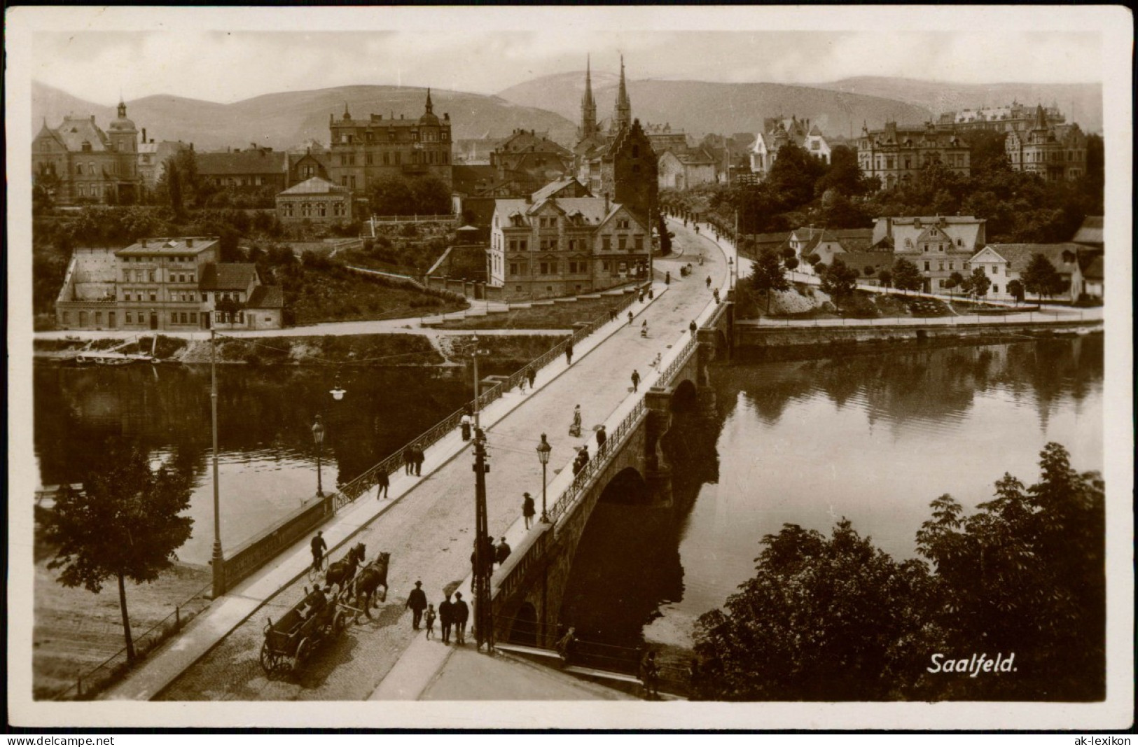 Ansichtskarte Saalfeld (Saale) Straßenpartie Und Brücke, Fotokarte 1934 - Saalfeld