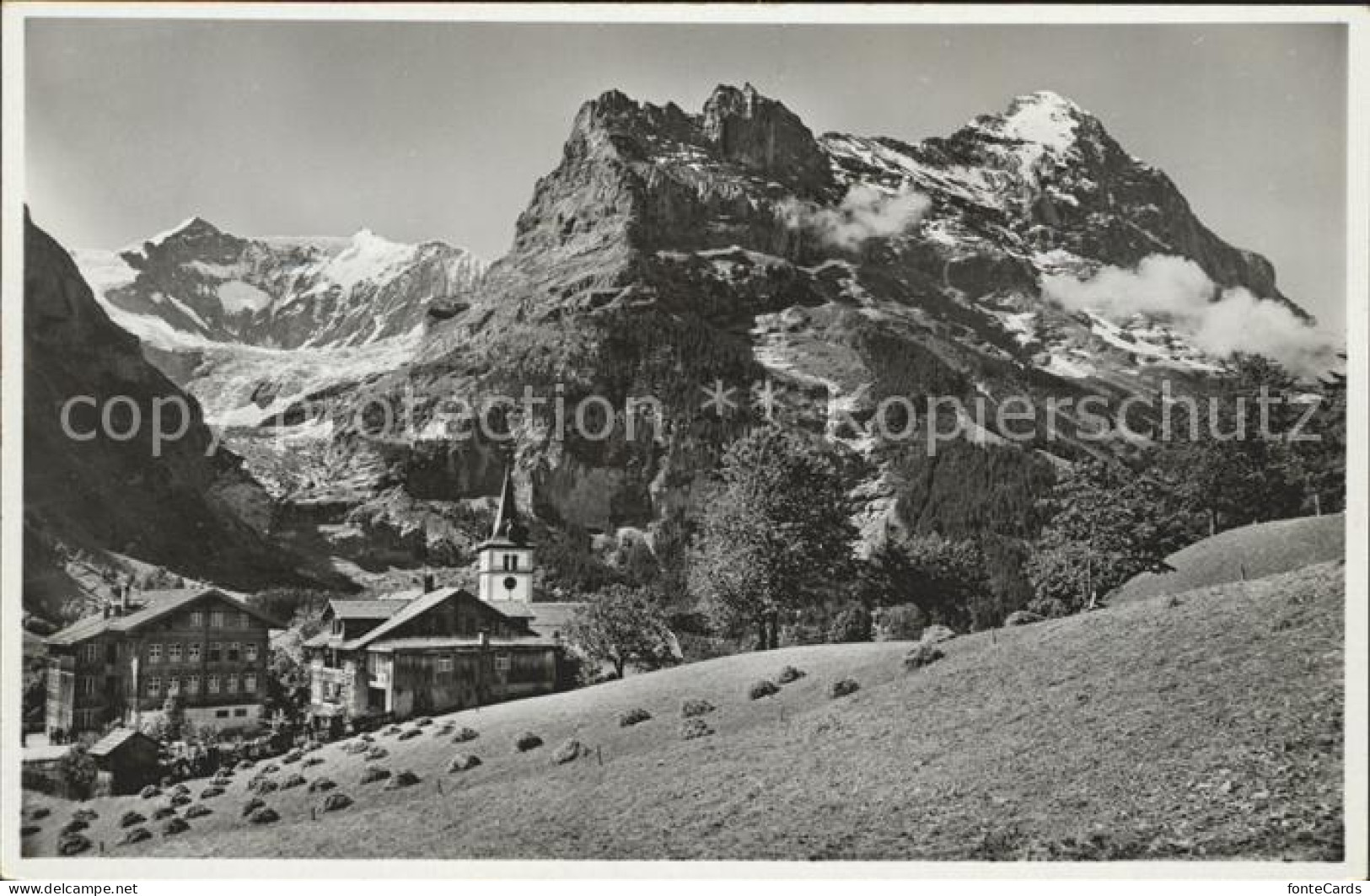 12039246 Grindelwald Kirche Mit Eiger Und Fieschenwand Grindelwald - Other & Unclassified