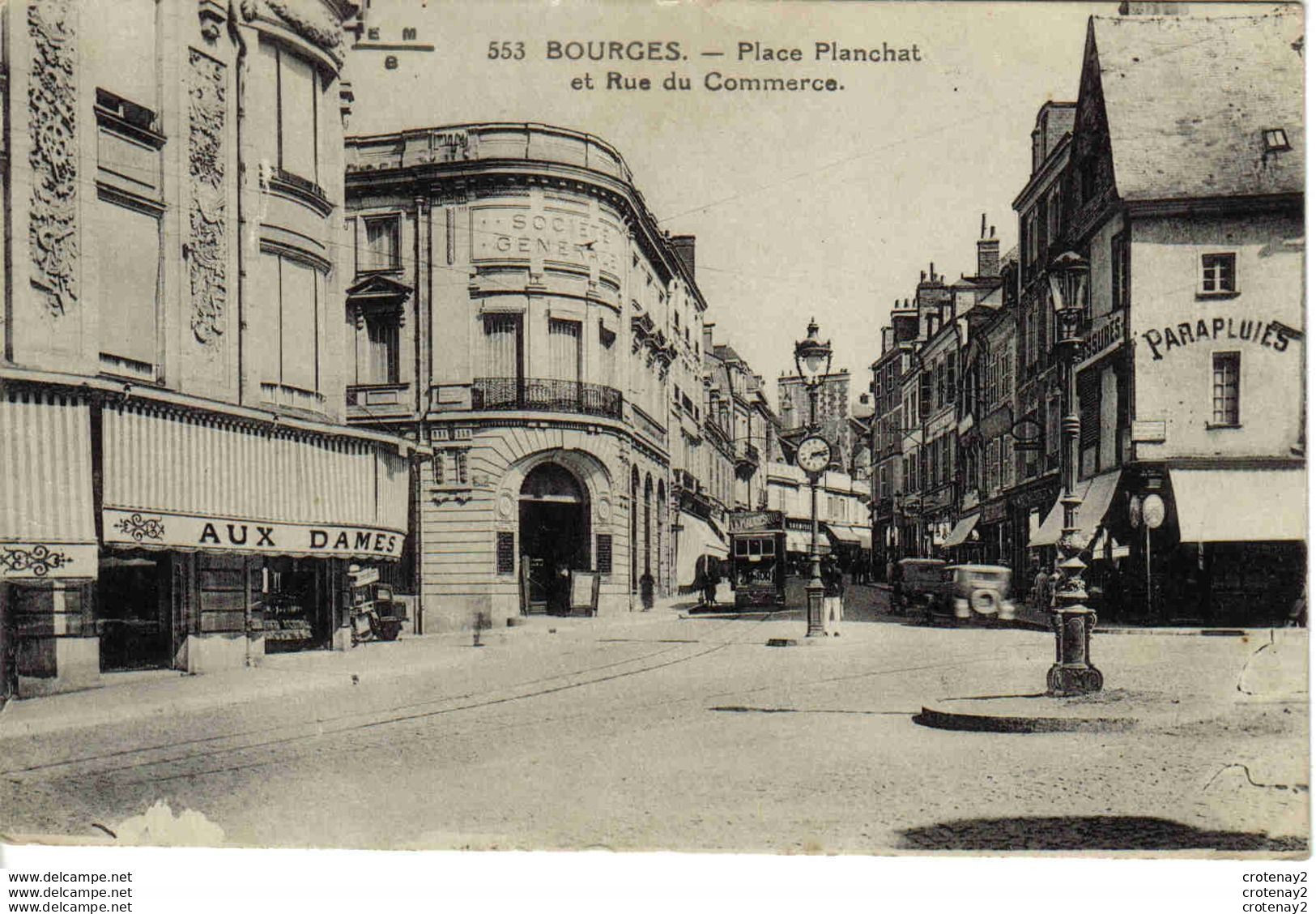 18 BOURGES N°553 Place Planchat Rue Du Commerce Dames De France Parapluies Tram Tramway PUB La Mauresque PERAS - Bourges