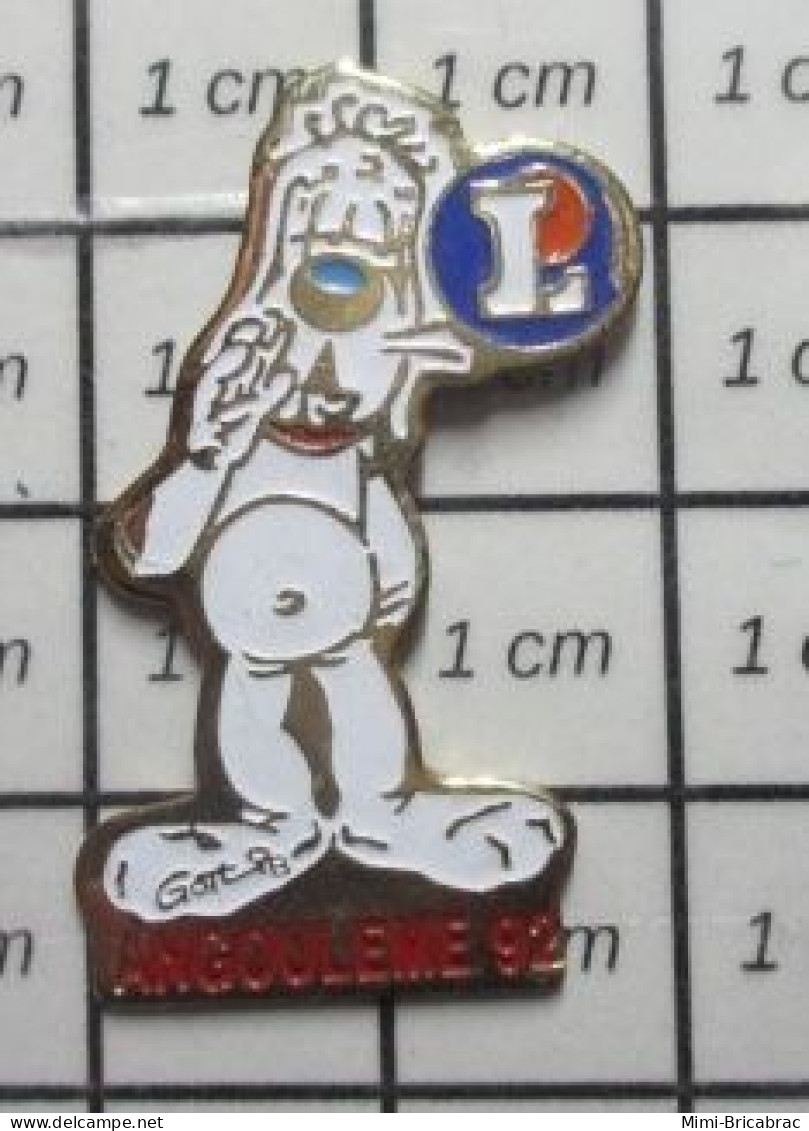 912c Pin's Pins / Beau Et Rare / BD BANDE DESSINEE / GAI-LURON ANGOULEME 92 MAGASIN LECLERC - Fumetti