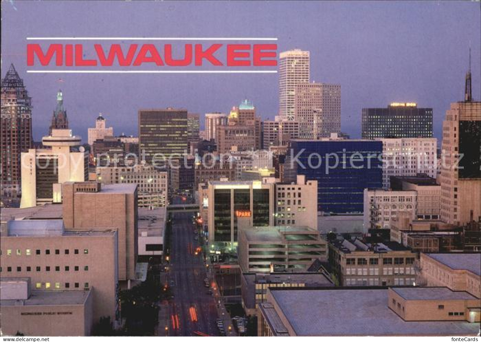 72444574 Milwaukee_Wisconsin Wells Street Downtown Skyscrapers By Night - Andere & Zonder Classificatie