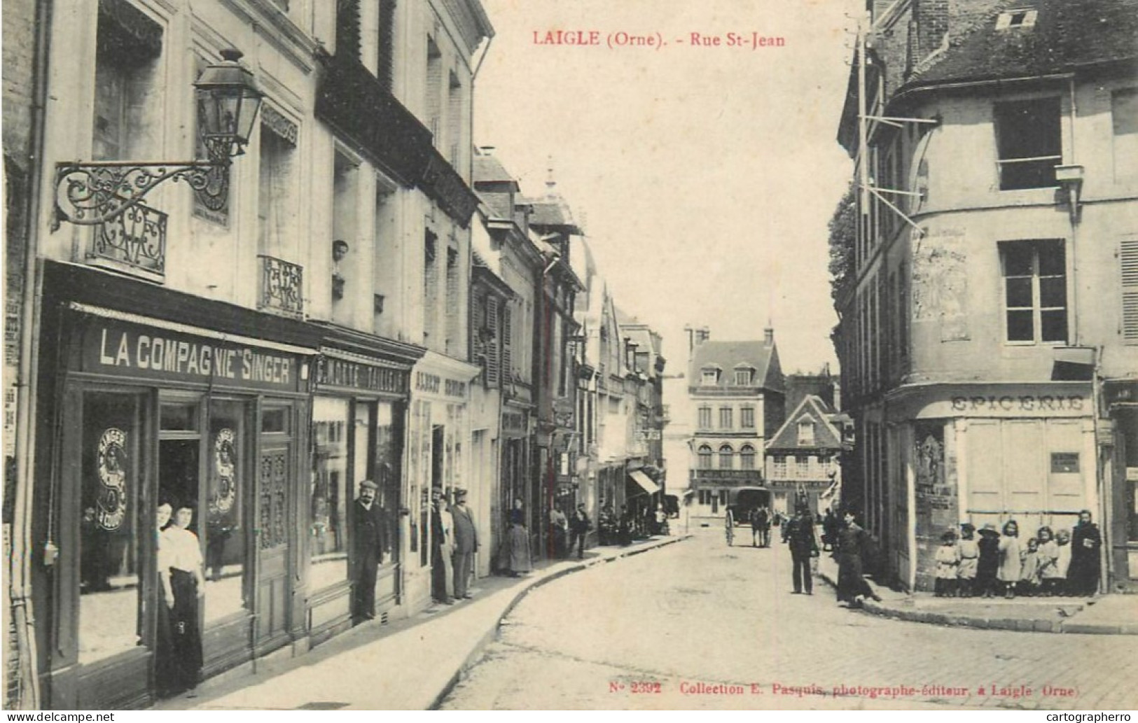 Laigle, Rue St-Jean Magasins Singer Epicerie 1909 - L'Aigle