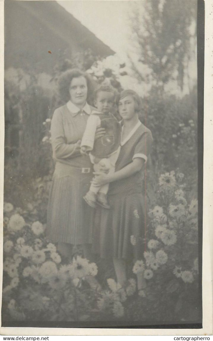 Social History Souvenir Photo Postcard Mother And Children In Flower Field - Photographs