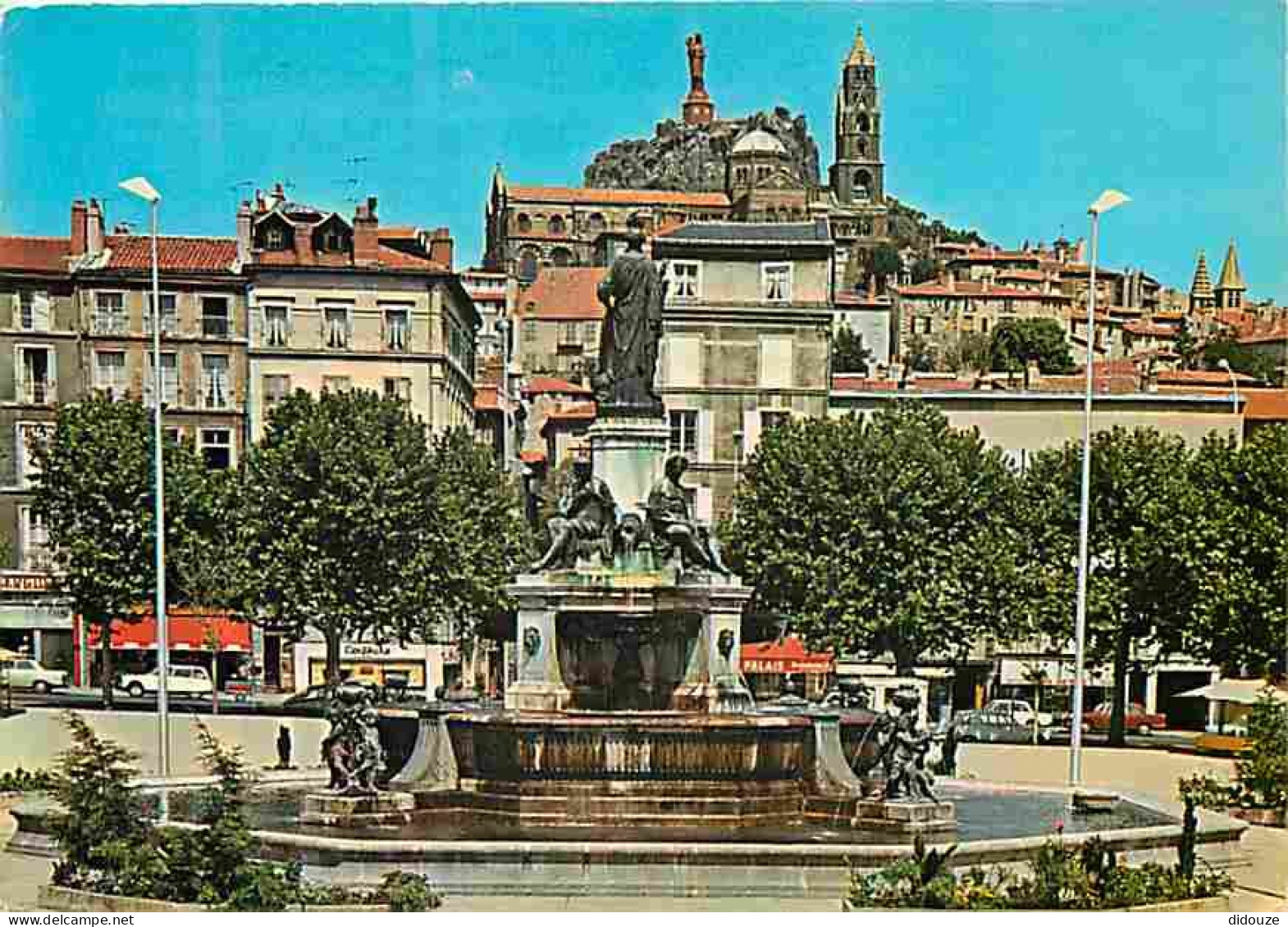 43 - Le Puy En Velay - Place Du Breull Et Fontaine Crozatier - Automobiles - Commerces - Flamme Postale - CPM - Voir Sca - Le Puy En Velay