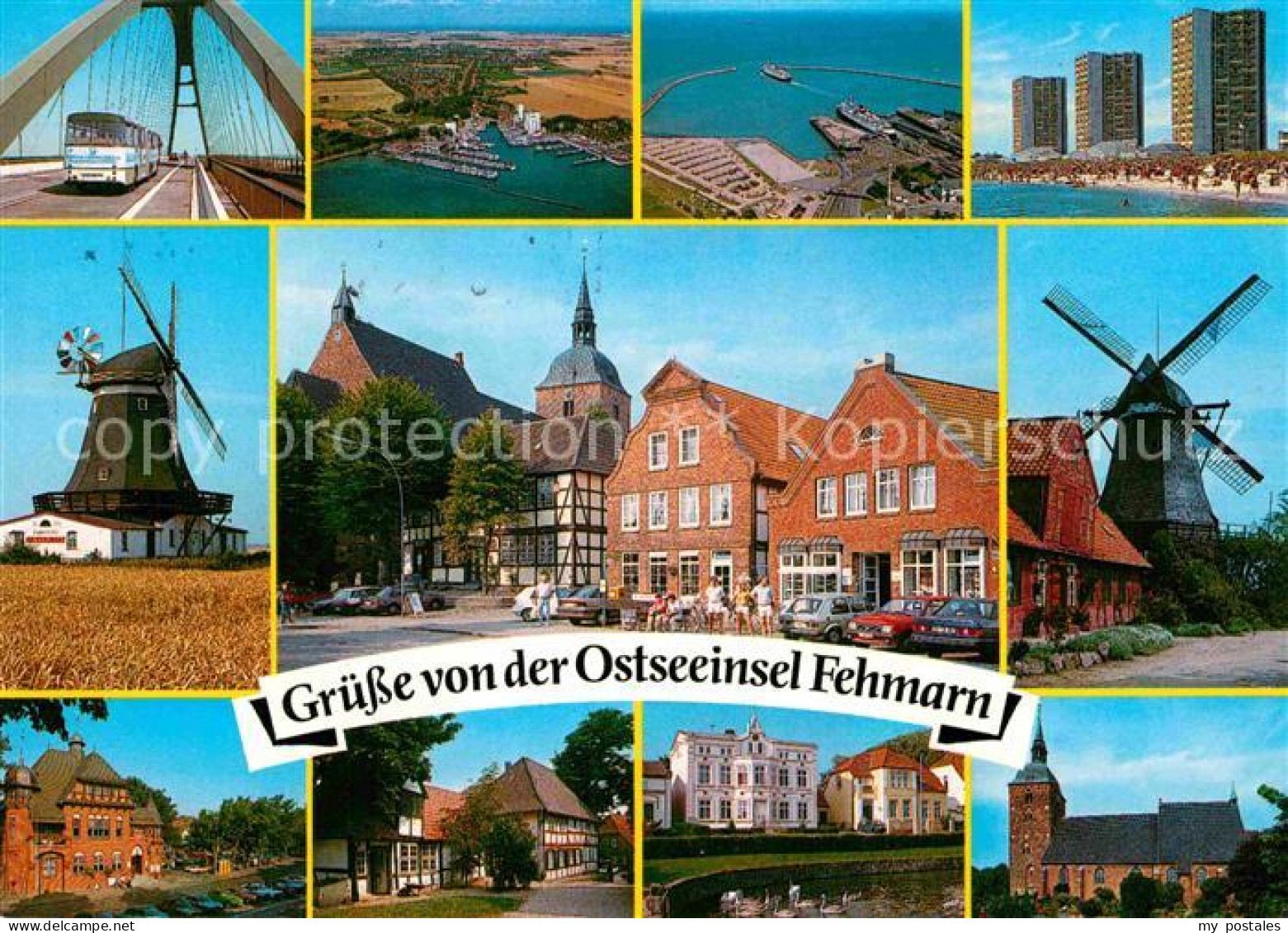 72844396 Fehmarn Fehmarnsundbruecke Windmuehle Hafen Hotels Am Strand Ortsmotiv  - Fehmarn