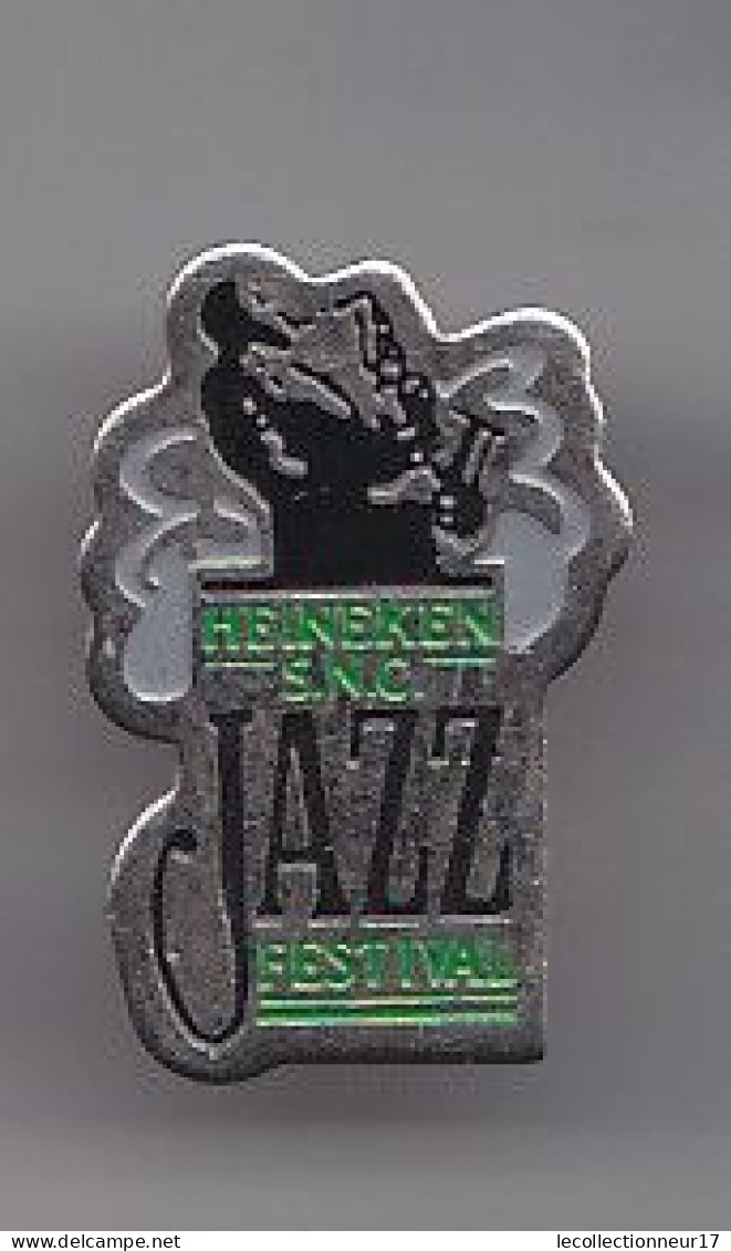 Pin's Heineken SCN Festival Jazz Joueur De Saxo Saxophone Réf 4749 - Musik