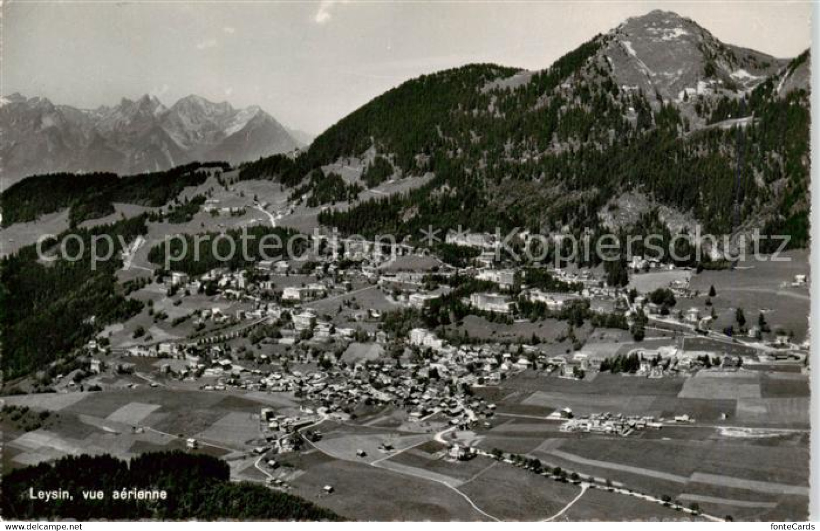 13861577 Leysin VD Et Les Alpes Vue Aérienne  - Otros & Sin Clasificación