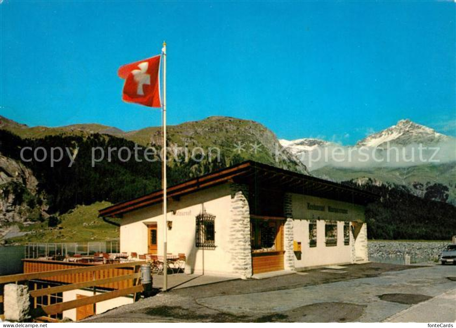 13311199 Julierpasshoehe Restaurant Marmorerasee Am Julierpass Schweizer Flagge  - Other & Unclassified