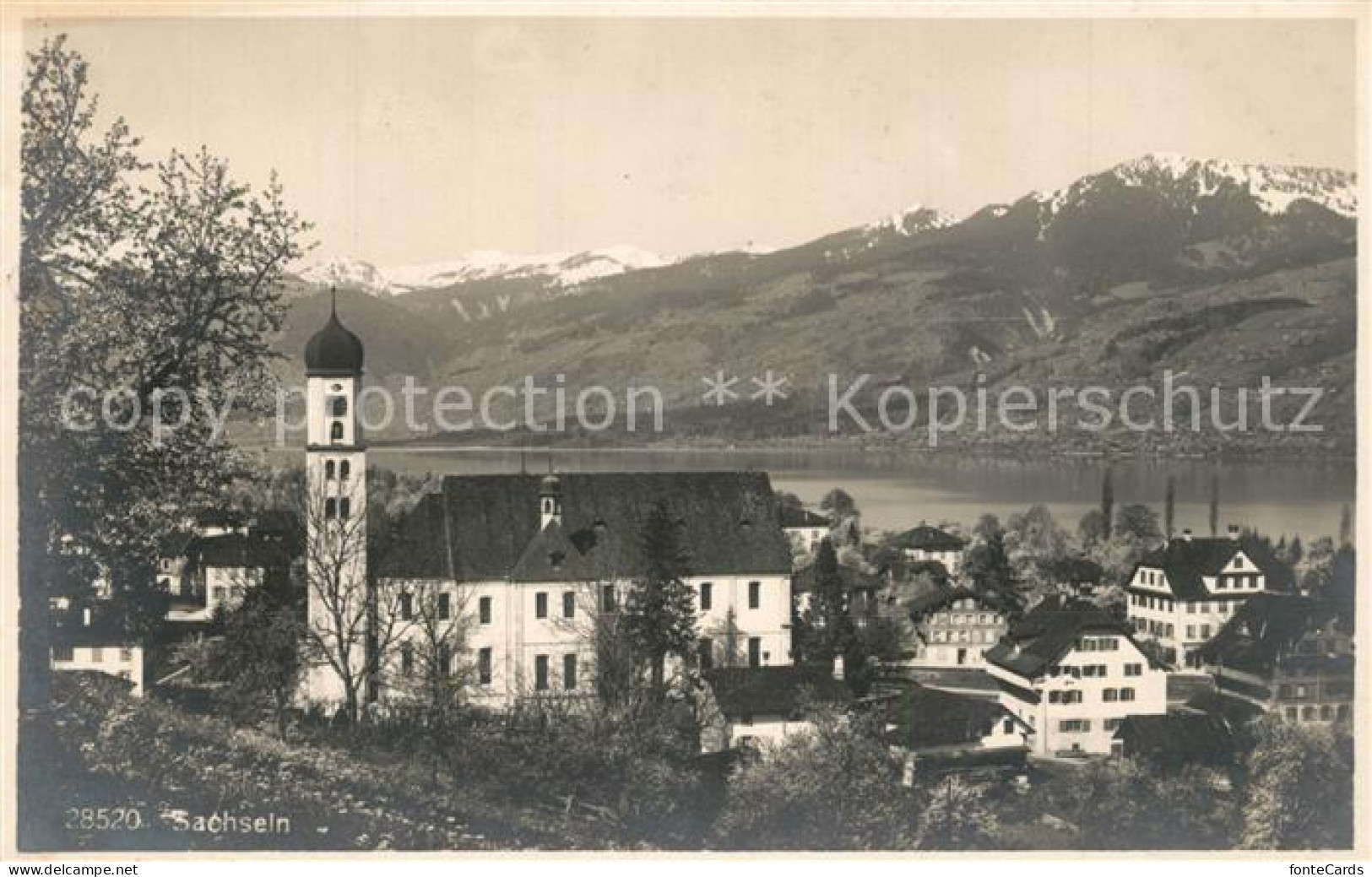 13307777 Sachseln OW Ortsansicht Mit Kirche Sarnersee Alpenpanorama Sachseln OW - Andere & Zonder Classificatie