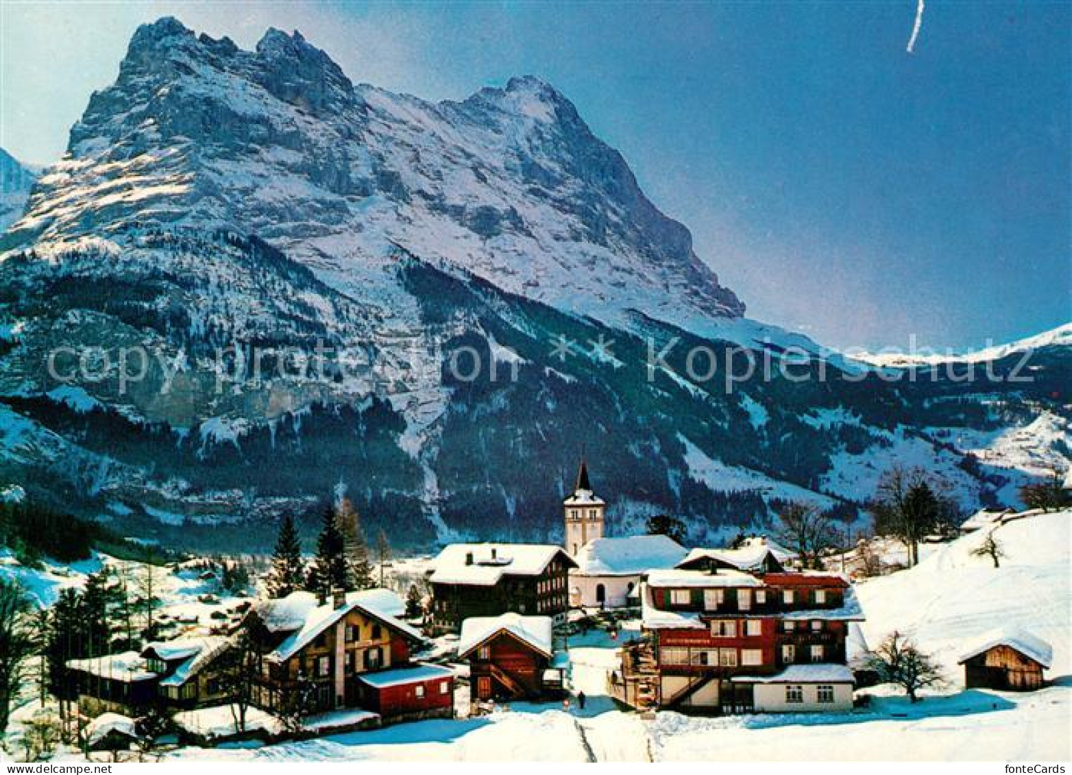 13143807 Grindelwald Dorfpartie Mit Kirche Hoernli Eiger Winterpanorama Berner A - Autres & Non Classés