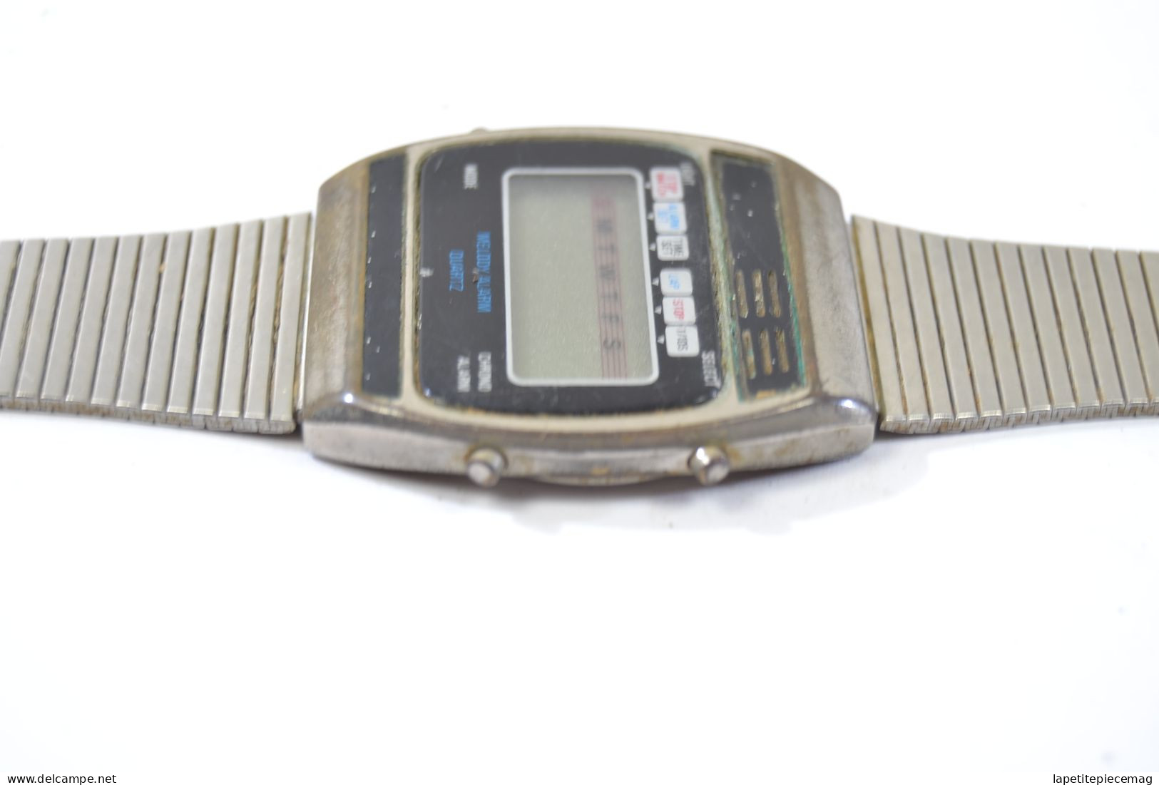 Ancienne Montre Melody Alarm Quartz Hong Kong Années 1980. - Orologi Antichi