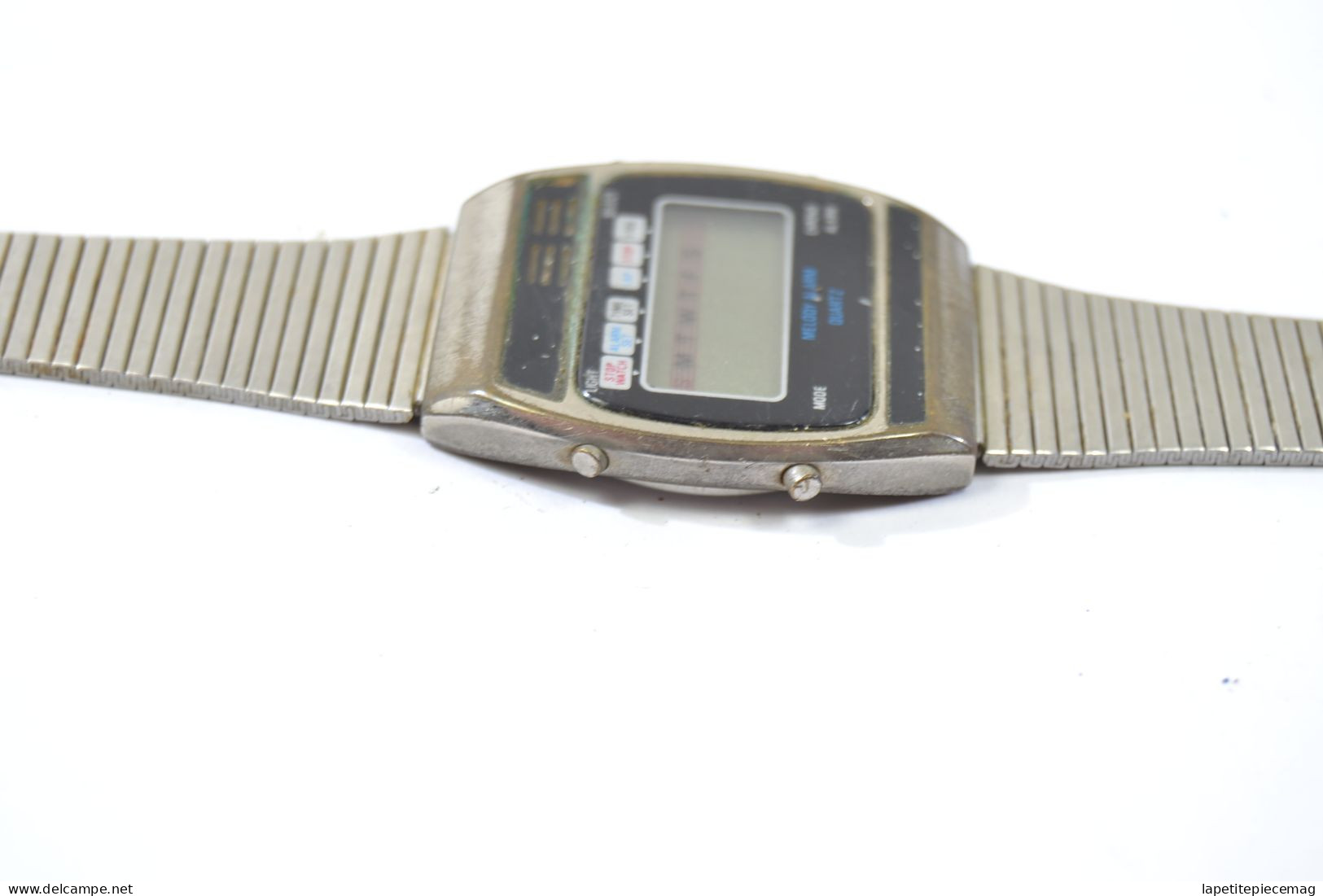 Ancienne montre Melody alarm quartz Hong Kong années 1980.