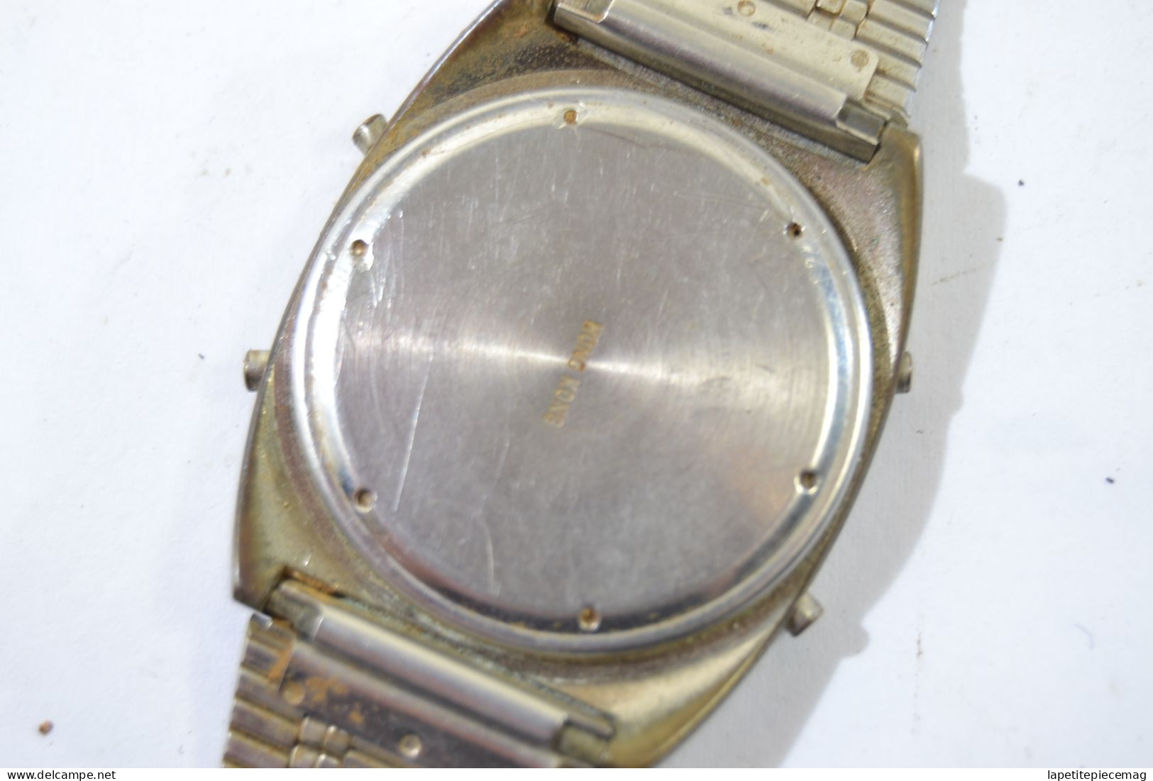 Ancienne montre Melody alarm quartz Hong Kong années 1980.