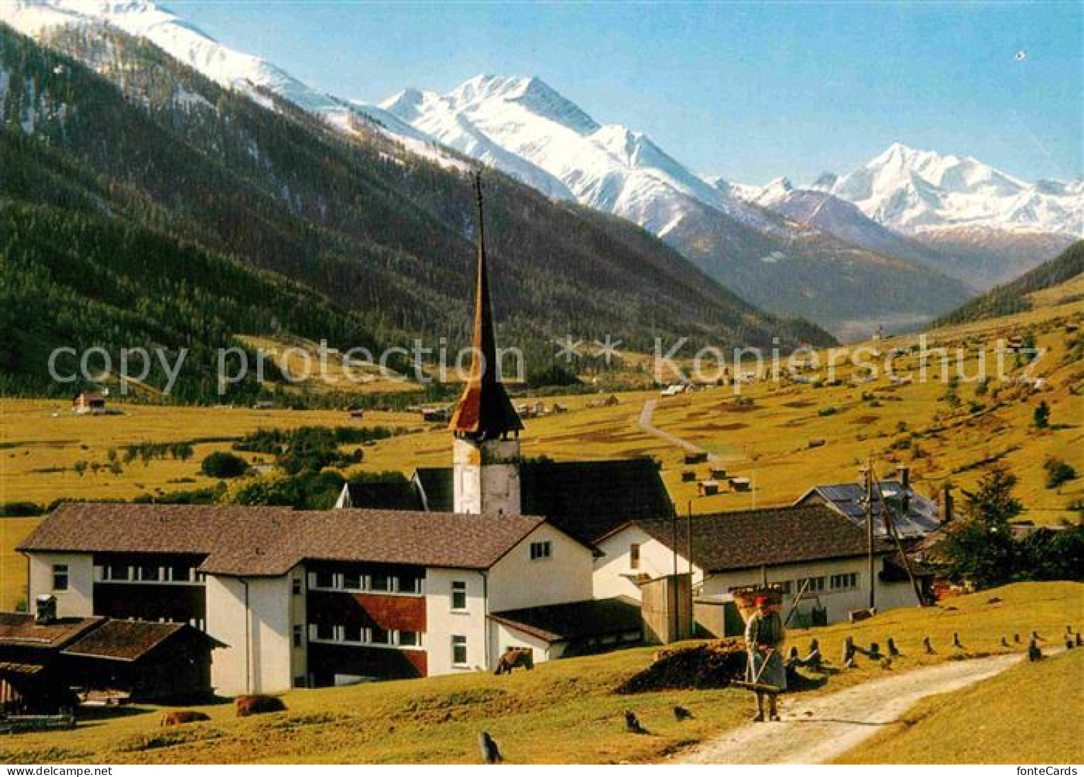 12807587 Muenster Goms Ortsansicht Mit Kirche Blick Zum Weisshorn Walliser Alpen - Sonstige & Ohne Zuordnung
