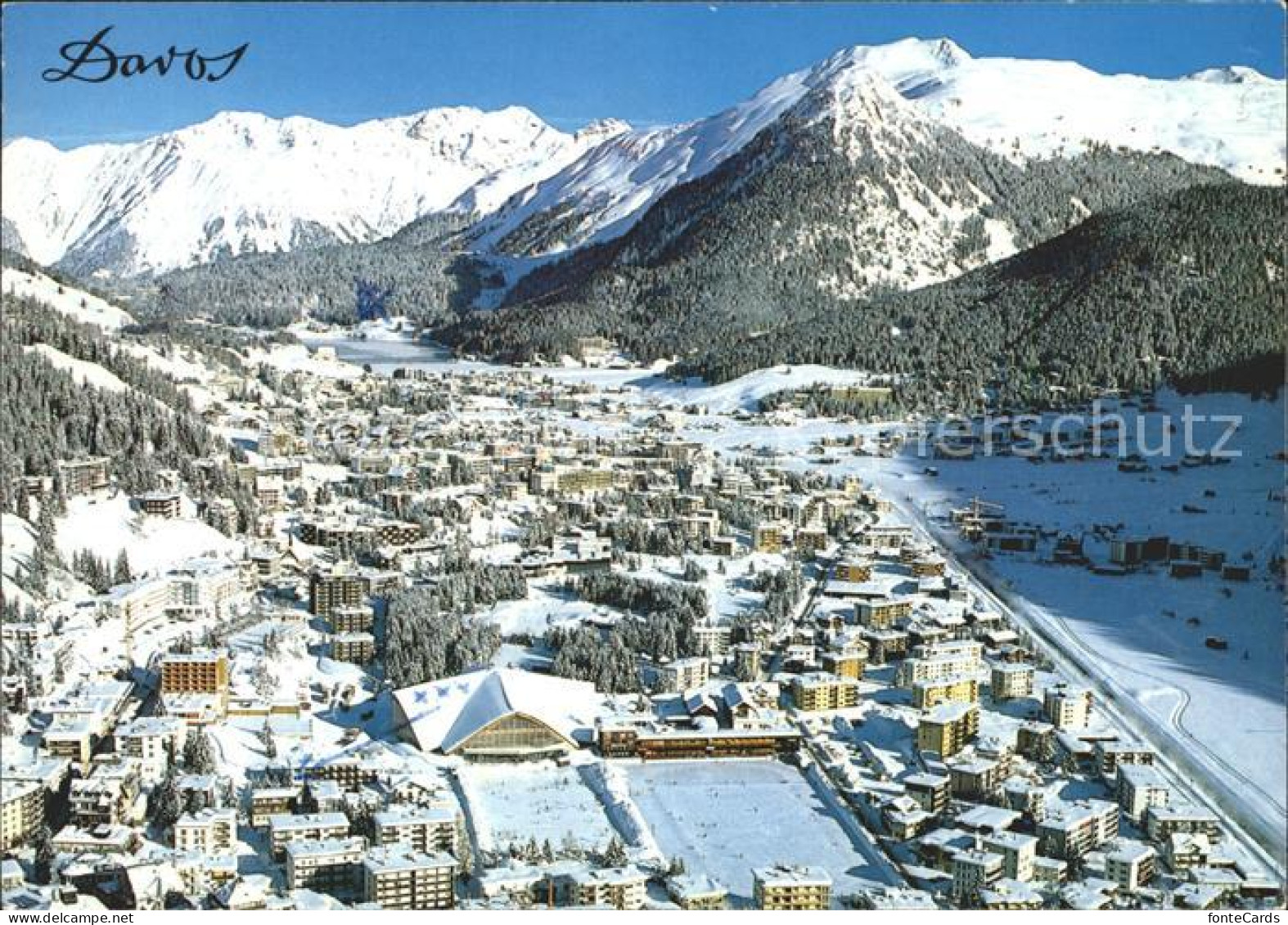 11947027 Davos GR Fliegeraufnahme Eissporthallle Eisbahn Rhaetikon Seehorn Davos - Altri & Non Classificati