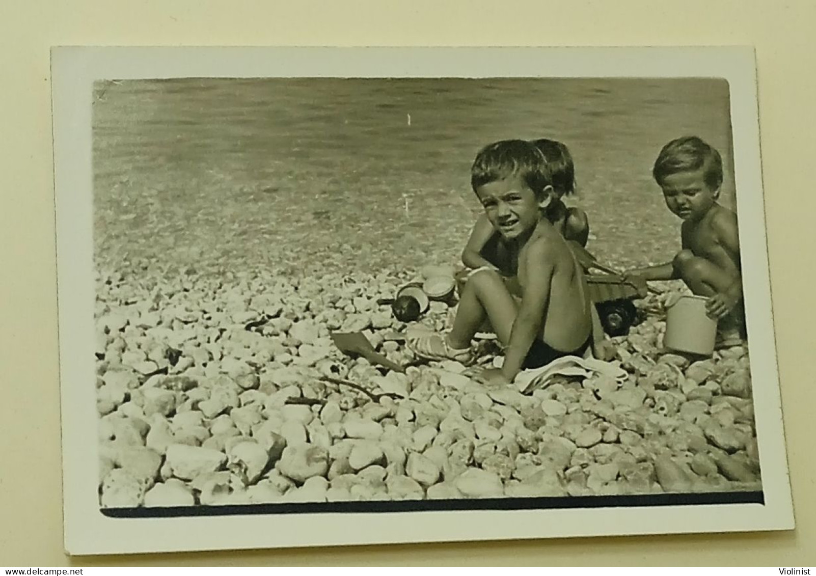 Children Are Playing On The Beach - Anonymous Persons