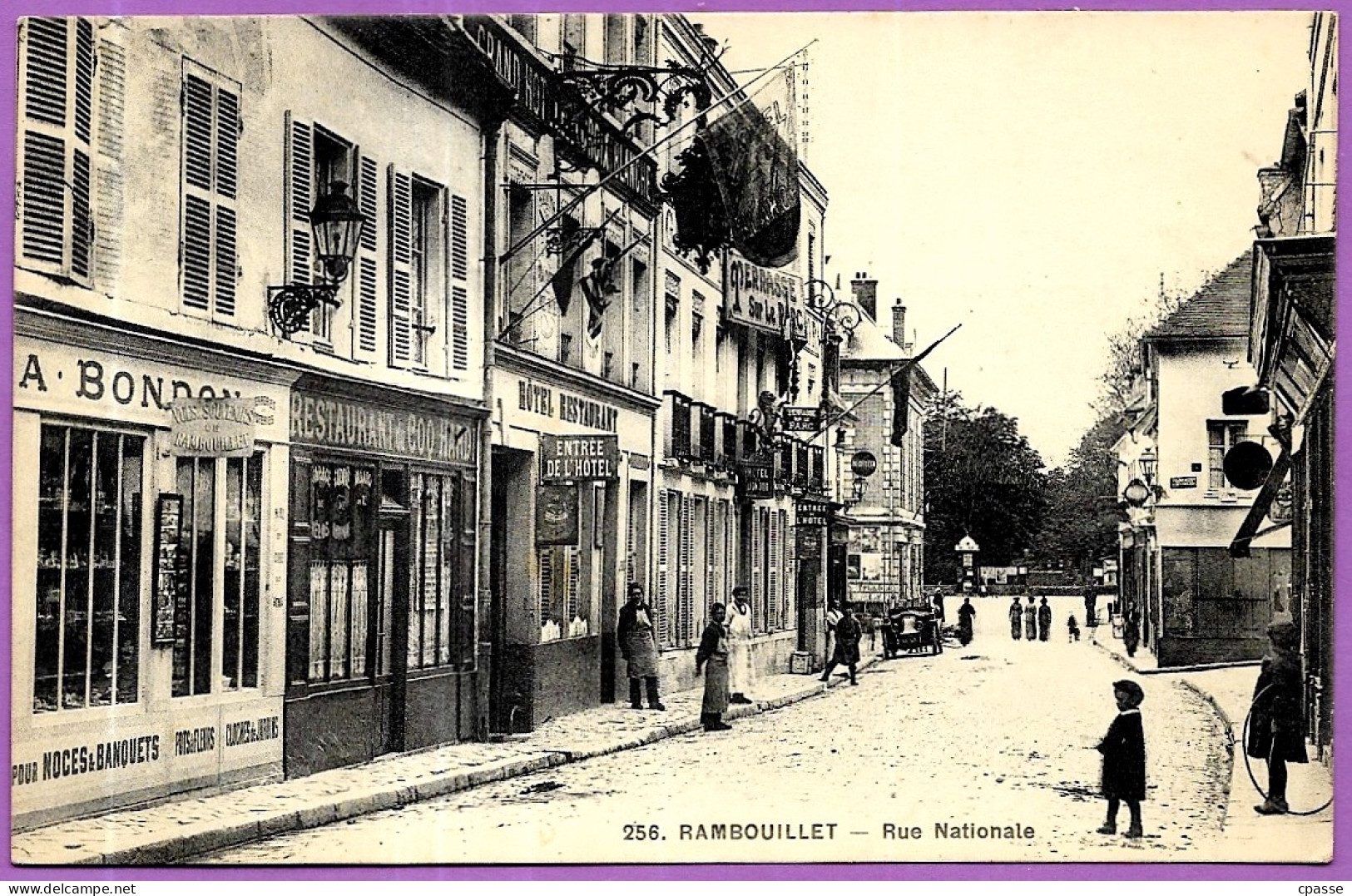 CPA 78 RAMBOUILLET - Rue Nationale (Commerces Dont Restaurant Du Coq Hardi) - Rambouillet