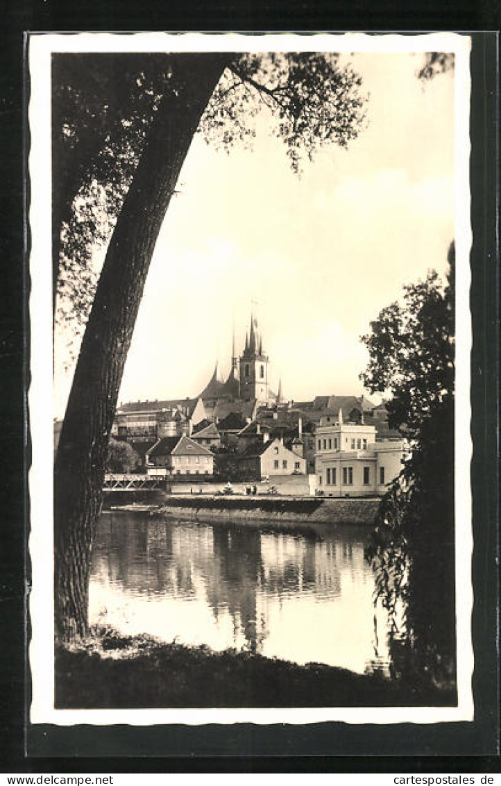 AK Laun / Louny, Flusspartie Mit Kirche  - República Checa