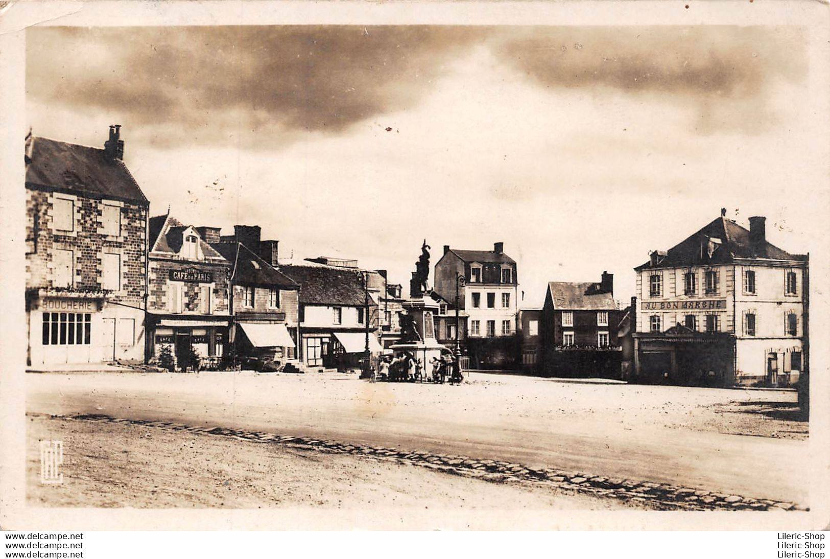 11. BRIOUZE (61) - La Place De L'Eglise - Boucherie - Café De Paris - "Au (Bon Marché" - Monument Aux Morts - CAP - Briouze